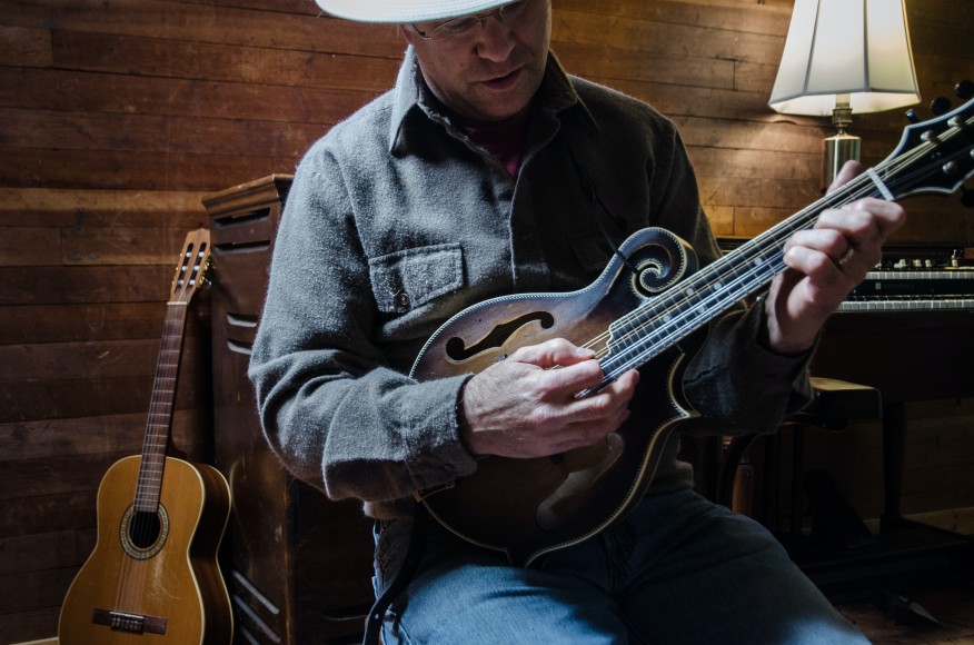 elderly gentleman playing Mandolin